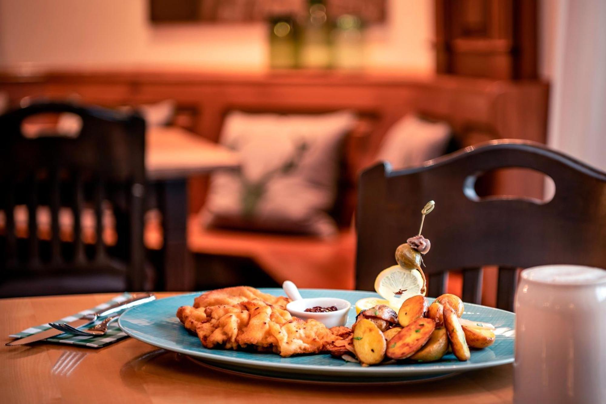 The Westin Grand Munich Hotel Ngoại thất bức ảnh A plate of fish and chips